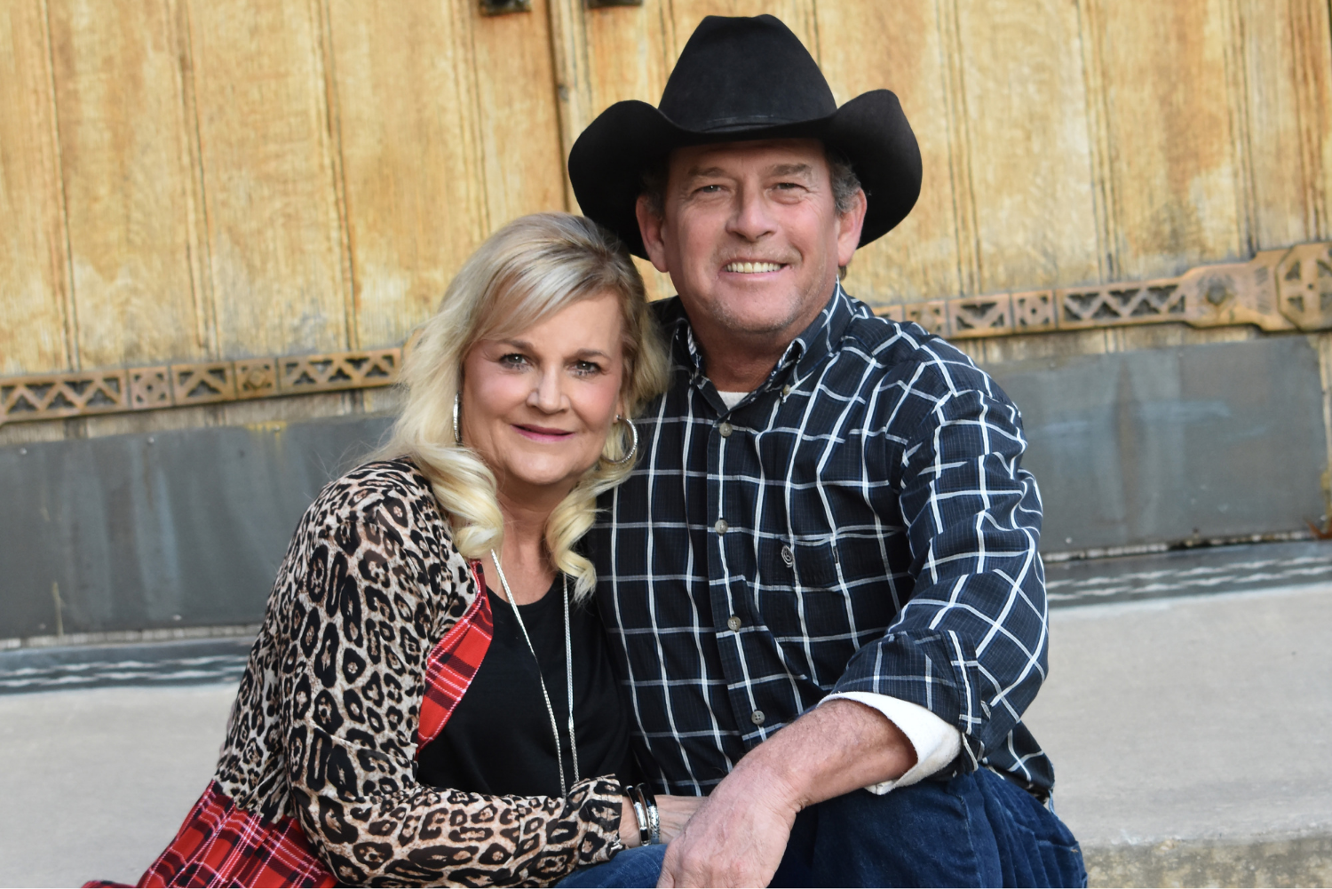 Jody and Rhonda pose for a photo in an outdoor setting.